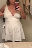 Very stretchy! I was worried about the fit in the bust, but it ended up being plenty big! I got my grandmother to take it in a little in the top and bring the v up a little. - Kate B.