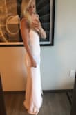 This dress was the most flattering dress I have ever worn. I wish I could wear it to every event I ever go to. I'll be ordering additional colors. I should have gotten it hemmed, next time! - Whitney B.