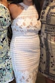I loved the dress. I did wear spanx shorts underneath and the dress kept twisting to the side, so that was annoying. But overall I loved it.  It was a little snug but not absurdly. - Pamela L.