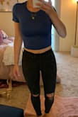 This was a pretty cute top, but it wasn't navy. It was more of a royal blue, and also a bit see through. I ended up returning it as it wasn't the color I was looking for. - Samantha O.