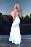 This dress was the most perfect thing for my college ball! It fit so well to size and clung to my curves very nicely and is lined so great that you couldn't see my underwear underneath as i bought the white version. It also shows off a perfect amount of skin and enough of my tattoos to be super tasteful. I would recommend this dress to anyone that wants to make a statement and just feel like a queen for a night. - Joelle D.