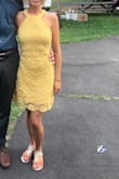 Loved this dress! Fit perfectly. Was wonderful for an outside august wedding!
I'm short but it hit just above the knee. Normally these style dresses are too long. - Meggan K.