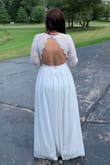 Sleeves was a little loose but still beautiful. Rest of dress fit perfectly! My husband and I got married at courthouse and I had so many compliments. And the price was so cheap for such a beautiful dress!!!!!!! Not made cheap neither! I highly recommend.
A little long but great with heels... - Angela S.