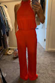 Love this jumpsuit. So unique. Material is soft and flattering. I usually have a problem finding jumpsuits long enough in the torso, but this is plenty long (I've even ordered an X-Small to see if it fits better)
Legs are long and will need to be hemmed, but that's to be expected.
Will have to wear some pretty skimpy "sticky boobs" since the front cuts in pretty flat against the front part of my chest, but the jumpsuit as a whole is super fun! - Mariah S.
