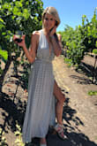 This dress is AMAZING! It flows beautifully in the wind and has a sexy, but still can be modest back. Light and airy and perfect for day drinking! - Kasey R.