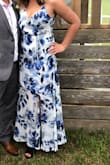 This dress is beautiful and I got a lot of comments on it when I wore it to a wedding. The only thing that was an issue is that under the armpit area/ on the side of the boob area there was a lot of extra fabric. I ended up pinning the extra fabric and sewing it from the inside so you couldn't tell. I don't think this was a sizing issue as the rest of the dress fit well, it was just oddly made in that specific area. Other than that I really liked it. - Julia L.