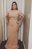 This dress it's gorgeous. I wore this dress to a wedding. I got so many compliments. Fits my nice curves very nice. Might order another one but different color. Definitely recommended :) - Karina C.