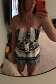 I went off the reviews that people said it runs a little tight on the top and I'm glad I sized up because I have a bigger bust. It fits perfect, not too short for tall people like me and great thicker material. Definitely worth it! - Crystal M.