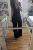 This jumpsuit fits like a dream. I got SO many compliments, and my sister said that I was morally obligated to wear it to the wedding I bought it for (I was deciding between two options.) It is on the longer side (even with 3-4 in. heels), but I prefer that fit. - Audrey A.