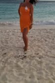 I always have a problem deciding what size to order in dresses. I read some reviews and decided to order a small. It fit but was a bit too tight. I was going to a destination wedding in Aruba. Wanted to be sure I felt comfortable so I returned it and ordered a Medium. It was perfect. Love this dress. The color is amazing. Perfect for a beach wedding. - Vanessa V.