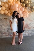 I wore this for my bridal shower and it was perfect! It was just a tad too big but I probably could have had it taken if I had time. I still wouldn't have sized down. It's not too short and is very classy looking. I received tons of compliments and was very happy with the dress. - Diane D.