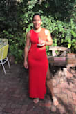 Dress hangs nicely and is a very good length for my height. I don't particularly like that the split is so high though. So if I wanted to wear spanx I couldn't because it would show. - Christina C.