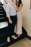 This has become a staple in my closet. I have worn it for so many events. I love That the back is adjustable with a tie and the legs are extra wide. I would buy again in a heartbeat. Don't hesitate on purchasing. - Kaley K.