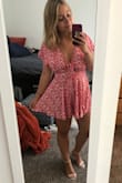 This romper is super flattering! Perfect summer outfit. Fits perfectly in all the right places and is very comfortable. - Emily S.