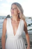 This dress is so pretty, I felt like Marilyn Monroe in it. I wore it for my engagement photos. I originally ordered a small(I usually am a small in Lulus dresses) and it would not zip up around my rib cage. I ended up exchanging it for a medium. This dress is meant for tall girls. I am 5'9 and I definitely could have worn heels with it. - Ashley S.