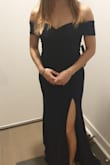 The dress is good quality and a bit stretchy. It fits well and looks really amazing just like the photos. Would buy again in a different colour! - Wan J.
