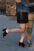 They fit true to size and are super cute. My only complaint is that they take a little time to figure out how to walk in them. Can be dressed up or down! - Colleen E.