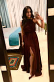 The material is super generous, and flowing. The color is exactly as shown. I'm 5'1 and the dress was a little long on me, and I should have gotten it hemmed. Despite not doing so, it was totally fine to wear with or without heels.  So happy with this purchase! - Megha P.