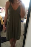 Beautiful dress but even when I ordered a size down to a medium (I usually get large dresses ) it was very loose and low cut on my chest so I was very self conscious with my bra showing in the front and sides. However you could go bra-less and not have that worry if you're ok with the deep v neck. I would order a size down for sure, especially if you're not tall or have a smaller chest. - Margo J.