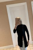 Love this shirt. A bit tight around the neck but not too tight. Slit shoes some skin but it's tasteful.
I ordered a small. - Renee N.