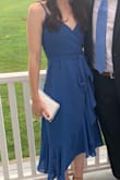 This dress is so comfortable and cute. I wore it to a wedding and it isn't uncomfortable when sitting or dancing. It does take some time to put on due to it being a wrap dress but other than that I love the dress. - Brianna D.