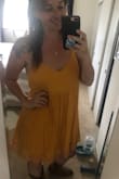 Loved this dress, it does sit loose, but it's supposed to. It is flowy and comfortable, and the under layer is thick so not see through at all. I packed it in a suitcase, and it was wrinkled when I got to my destination, but I hung it in the bathroom when I took a shower and the steam took the wrinkles right out! - Natalie L.