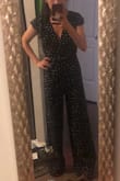 I lovedddd this jumpsuit! So comfortable and flattering. The open back made it breezy, and I was able to wear it on a warmer day. I paired with some booties and it made for such a cute outfit. The only downfall was the length. I had to get it hemmed. - Paige W.