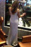 I wore this dress when I got eloped in Vegas. I couldn't ask for a better dress. The fabric was high quality and had an under layer so I didn't have to worry about it being see through with photos. I did have to get the straps taken in by a tailor but it cost under $20. I got so many compliments on this dress. I felt so pretty. - Jessica C.