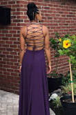 I loved this dress and got SO many compliments. I had to get the bottom of the dress hemmed about 2 inches. Also, be sure that you leave time when getting ready to basically have someone lace the back of the dress for you. Definitely a must buy. - Olivia H.