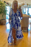 This dress is a showstopper! It's comfortable, sexy and in beautiful soft material. I ordered a size medium. I just ordered another one in a small to see if it comes just a tad shorter so I don't have to wear a higher heel. The dress is loose on the top so it shouldn't matter ordering a small. If it doesn't fit I'll just exchange it for a medium again. I ordered a second one so I can keep it in my other home out of state and I don't have to carry it back-and-forth, that's how much I like the stress! Hopefully Lulus will make it for a long time and in additional colors  because this dress is an absolute winner! Thank you Lulus! - Colleen B.