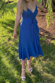 Overall a nice dress that was very comfortable but the blue of the fabric was MUCH brighter than expected. I also didn't love the fit. - Kaitlyn H.
