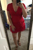 This dress was really tight in the arms. It fit in the chest but it was a little shorter than I hoped. Other than that it was really cute! - Anna H.