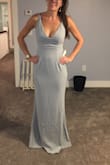 I love this dress. I would wear it in white to my wedding! It's stretchy and very form-fitting. - Meg L.