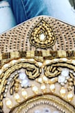 Elegant and well beaded. Goes great with a simple outfit to make a statement. - Heather P.