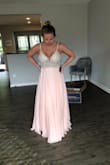 I had been waiting the order the white one forever, but then saw this blush version! It is so stunning in person! I can't wait to wear it in a beach photoshoot! It does seem to run a little small, I got a 6 (normal size 4-6) based on other reviews and it zips all the way up, but I can only get 1 of the 2 hook & eye closures clasped. It's not worth returning for a bigger size because then I would have to get everything else taken in. Everything else fits fine, no bra needed and for my height the length is perfect! - Anna C.