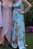 This dress was an impulse purchase, but I'm really happy with my choice. It's a little long, but I tightened the straps and wore tall heels to compensate. If I had the resources, I would have had it hemmed just a bit.
The gap in the chest is noticeable, but I used a pin to close the gap and feel more comfortable. - Jamie D.