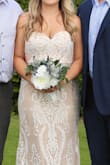 I bought this at the last minute for my intimate wedding ceremony in Laguna Beach and it was perfect! I'm pretty short, so usually I need to have dresses hemmed but this one was the perfect length with my four inch heels. I received tons of compliments, both from people at the wedding and on my photos - and everyone was shocked to hear it cost under $200! I ended up needing an XL because my bust is a bit bigger, but once I exchanged sizes it was PERFECT. Highly recommend!! - Maddie C.