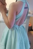 Love the mint aqua tone of this dress! Very fresh and make you look more tanned because it has a slight neon undertone. I like the neckline and two layers in the skirt that provides a nice silhouette. Unfortunately this dress runs very small. The material doesn't allow for much stretch. I was so disappointed when I purchased it that I could only get the zipper 3/4 way up comfortably. I'm normally an XS in all my Lulus dresses but definitely could've sized up to a S on this one! I like the overall look so much though that I'm hoping to go to a tailor to see if adjustments can be made! Maybe remove the zipper and have a lower back or put in buttons. - Jennifer B.