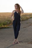 Love the look of this jumpsuit, wore it once at a photoshoot and washed it on cold, then put it in the dryer on low for a short time to wrinkle release (it wrinkles terribly). It shrunk up almost a foot and I can't wear it any longer. Really too bad that the fabric is rayon. Here is a photo of how it used to look prior to washing, for reference. - Alexandra C.