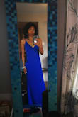 This is a great dress - the colour is fab, the length is long tho. For me, even w/ heels I need to have it altered. The colour pops w my skin tone and is mostly why I kept it. But it is a basic long spaghetti dress which I plan to save for another occasion.

It's well made and has some heft and weight to it. You'll love it! - Marjorie W.