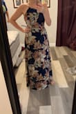 I bought this to wear to my brothers wedding and I absolutely loved it! It was a hot summer wedding so having the open back was so nice. - Amy J.