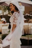 I had a tea party themed bridal shower and this dress couldn't have fit the event more perfectly. I received so many compliments. It's a thick lace which I appreciated to help me feel more comfortable. I definitely recommend. - Lyzette N.