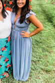 Loved this dress! I wore it to a friends wedding and got lots of compliments. The slit is in the middle, not off to the side (just a heads up). I am 5'3 and wore 3.5 inch heels, it was a little long but nothing unmanageable. The color is beautiful and the chest area fit me perfectly. I have a C cup and used some fashion tape and nothing moved all night. - Amanda H.