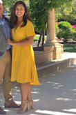 I wore this to a winery wedding and got sooo many compliments! It has the perfect length and it's longer in the back so my butt was covered even in the breeze. The only thing is because it is low cut I had to keep adjusting the wrap to make sure it didn't fall. But other than that it was perfect! - Roselle M.