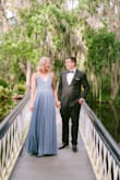 This was the perfect dress for my engagement photos! The dress fit perfectly but did run long. I'm 5'8 and had to have the dress altered. 
The dress is very well made and has 4 different layers that allow for beautiful movement and photographs perfectly! So happy with my purchase! - Victoria R.