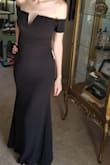 I love this dress! I got it for an all black attire wedding in January and can't wait to wear it. The thing I'm the most ecstatic about is it's long enough!! At 5'11", it's hard to find a long dress that actually goes to the floor - success! For most, it will probably have to be altered. I did have to bend the V on the chest to form my chest because it was straight and stuck out awkwardly. The material is thicker than I expected so it feels high quality and forms to all my curves and actually makes me look like I have some curves. - Jessica S.