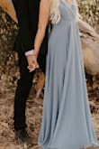 This dress is great quality and very flattering. I didn't even need to wear a bra with it. The picture attached has a preset on it, but the actual color is a beautiful mauve blue. This would be a great bridesmaids dress. - Tyler M.