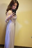 The material is soft, light and flowy (not clingy). Extremely comfortable and versatile. 
Fits true to size, I am a 32D and found going w/out a bra better suited this dress/material. I would suggest covers. 
I did however have the dress hemmed as I'm quite petite. 
I would highly recommend this dress for any occasion. Love it! - RICHELLE S.