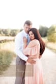 I ordered this dress for our engagement pictures and loved it! I wish I wouldn't have procrastinated and ordered sooner than I did. It came in very quickly but the shoulder length was a little long so it kept falling down on me. Other than that it was perfect! The material was heavy and great quality. I highly recommend it! - Annia M.