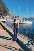 Love this romper!! It is the perfect romper for any occasion and can be dressed up or dressed down. The material gets wrinkled easily so make sure to iron it before wearing! It's perfect though for a nice night out to dinner, walking around shopping, etc! Highly recommend! - Madison N.